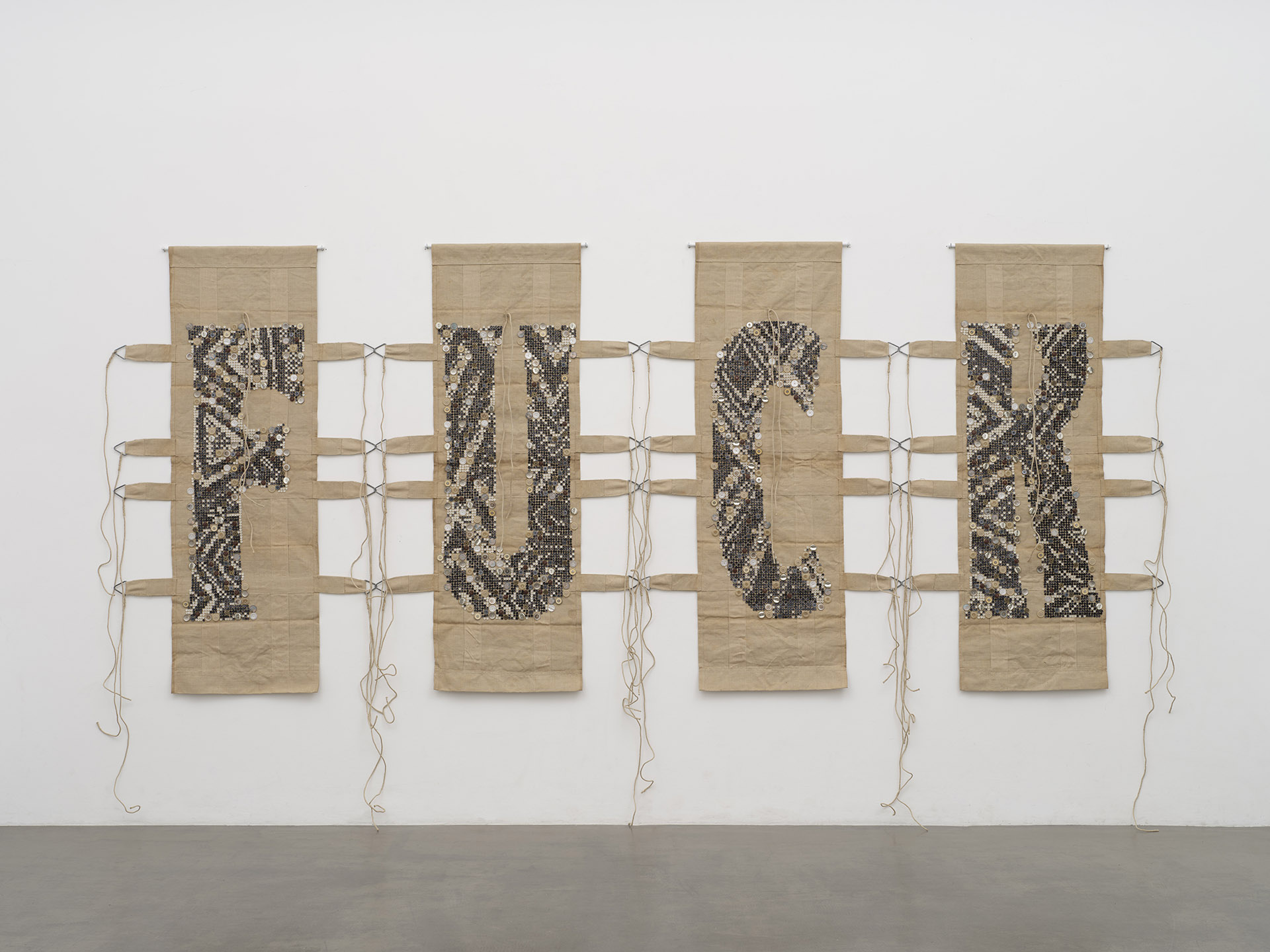 Ai Weiwei, F.U.C.K., 2024 | Buttons, fabric | Each panel: 188 x 110 cm each | Installed: 283 x 445 x 7 cm | © Ai Weiwei Studio | Courtesy of Ai Weiwei Studio.